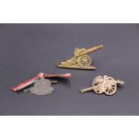 Three Great War sweetheart brooches / badges in the from of artillery pieces