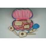 A cased 1950s dressing table set etc