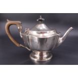 A George V silver bachelor's / cabaret tea pot, Henry Matthews, Birmingham, 1912, approx 13 cm high,