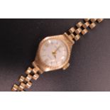 A 1960s ladies "The Angus" 9ct gold wristlet watch on rolled gold bracelet strap, (a/f)