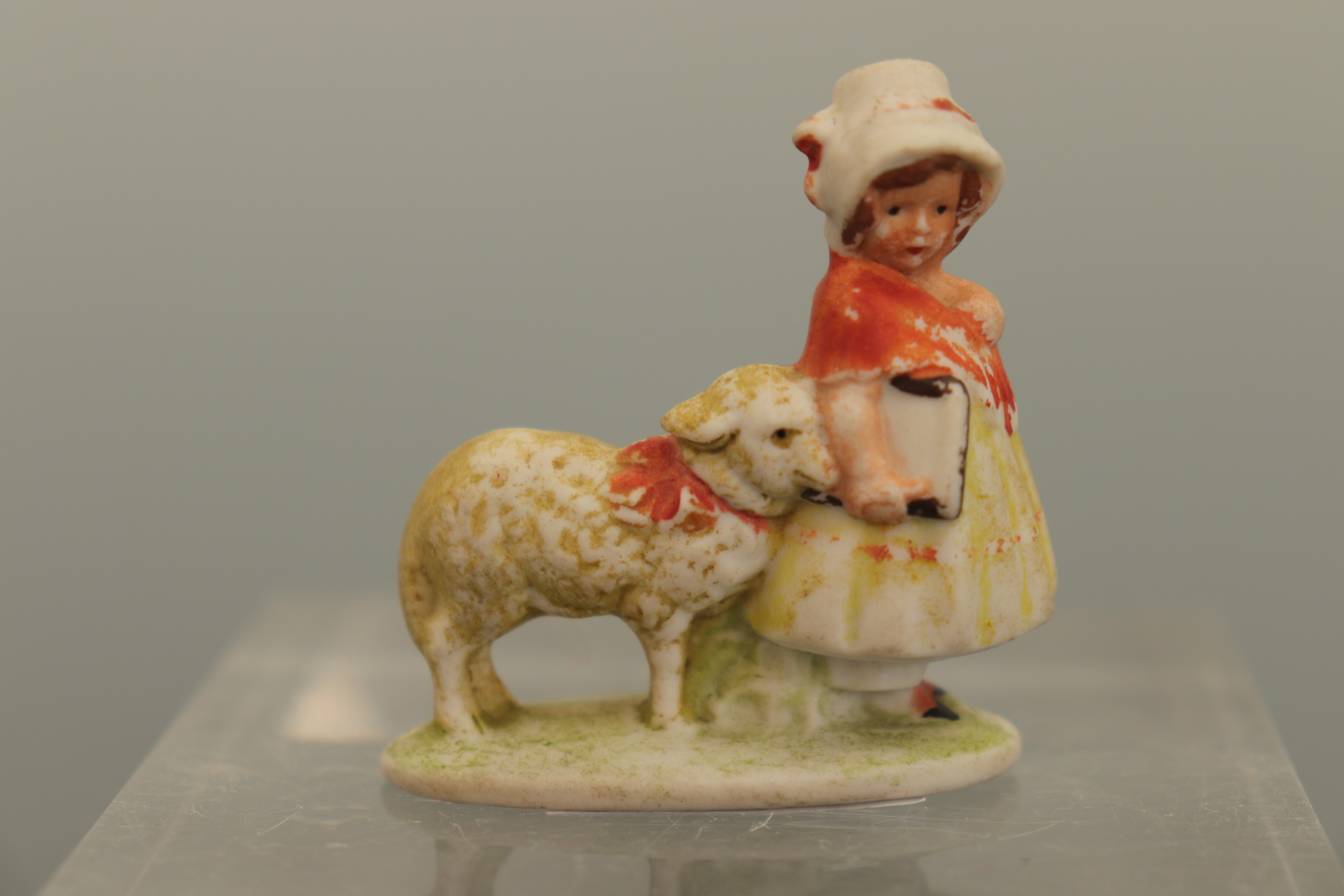 A Belle-Epoque porcelain pin lady together with a souvenir of Edinburgh (a/f) and a bisque porcelain - Image 4 of 5