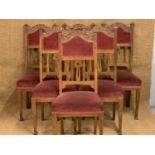 Six late 19th / early 20th Century Arts and Crafts influenced carved oak dining chairs