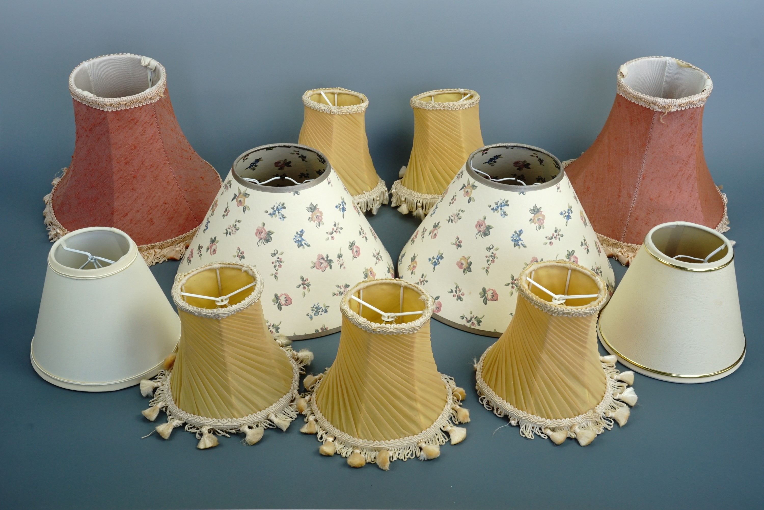 A quantity of small lamp shades suitable for electric girandoles, electroliers and bedside lamps