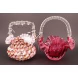 Two 19th Century glass bon bon baskets, including one of cranberry glass, 21 cm