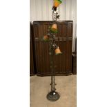 A bronzed standard lamp modelled as fruiting trailing vine, with marbled glass shades, 210 cm
