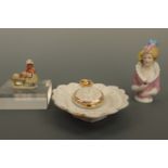 A Belle-Epoque porcelain pin lady together with a souvenir of Edinburgh (a/f) and a bisque porcelain