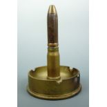 A 1943 trench art ashtray fabricated from a British 25-pounder artillery shell case and a canon