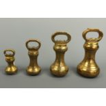 Four brass bell weights