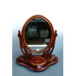 A Victorian mahogany swivel toilet mirror, 67 cm