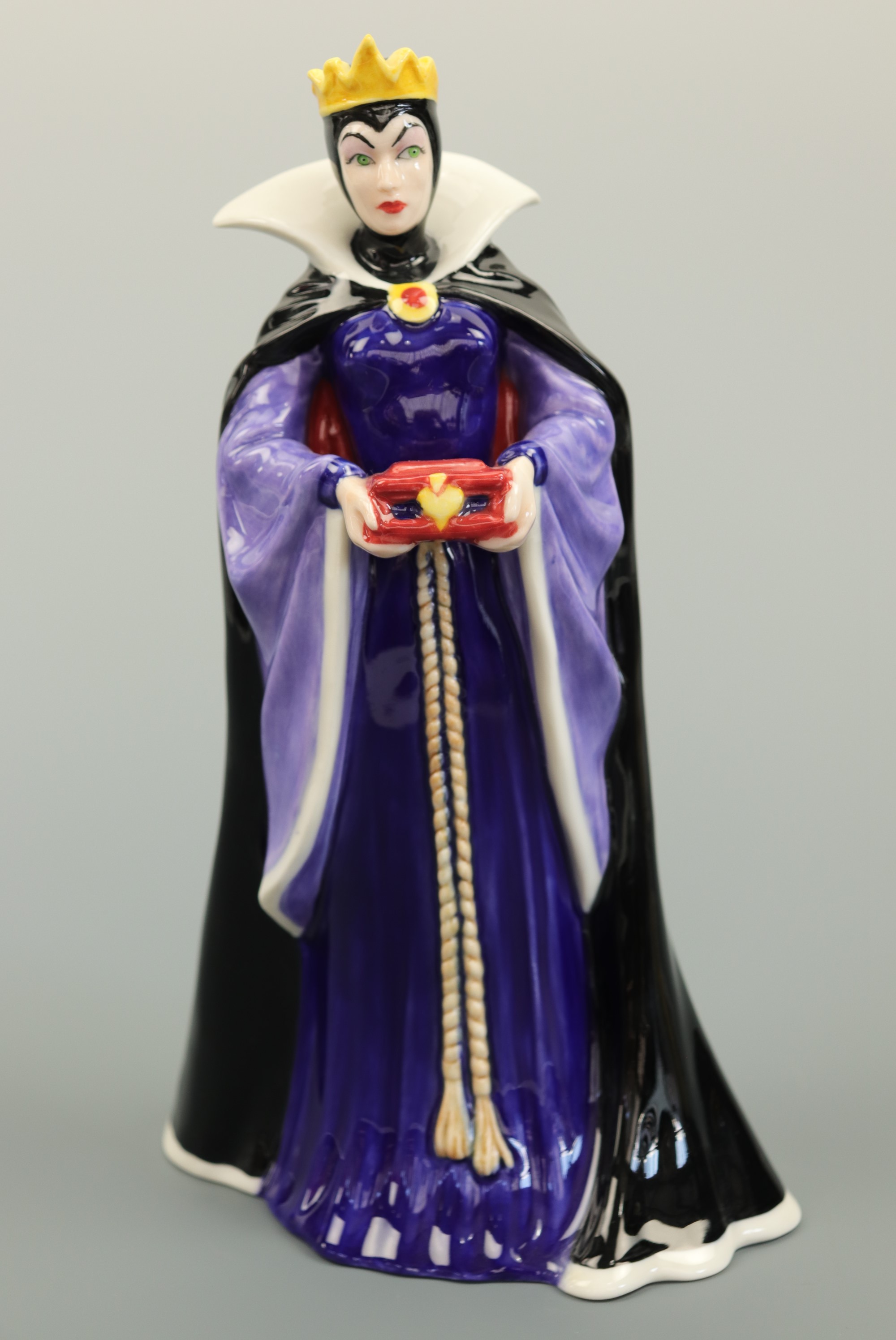 A Limited Edition Royal Doulton figurine from the Disney Villains Collection; 'The Queen from Walt