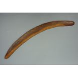 An Australian aborigine boomerang, 69 cm