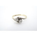 A twist-set two-stone diamond ring
