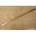 A vintage Ridgely wooden yard stick