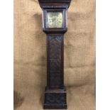 A George III brass-faced 8-day long case clock by Wilson of Kendal, in carved oak case, 194 cm
