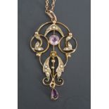 A Belle Epoque amethyst and pearl openwork pendant on a fine-link neck chain, stamped 9ct, 4.5 cm,