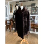 A lady's faux fur coat