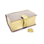 An antique yellow metal book clasp (tested as 22 carat gold),