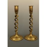 A pair of double-helical brass candlesticks, 26 cm