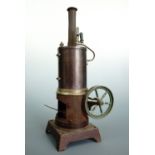 A 1920s German vertical live steam engine with reverse function, possibly Marklin, 28 cm