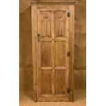 A George V oak linenfold panelled hallrobe, 80 cm x 40 cm x 183 cm