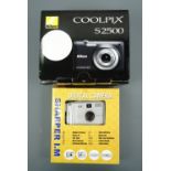 A Nikon Coolpics S2500 digital camera together with a Sharper IM digital camera
