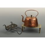 A 19th Century copper kettle and two trivets, kettle 28 cm