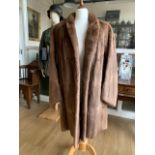 A 1940s lady's fur coat with rolled collar