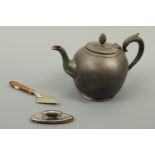 A silver nail buff, a Victorian Britannia metal bullet-form teapot by Dixon of Sheffield and an