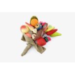 A vintage novelty handmade brooch in the form of a ribbon-tied bouquet of fruit and flowers
