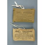 Two Second World War Home Officer Air Raid Precautions shell dressings, dated 1938 and 1939