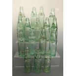 A quantity of antique Codd's patent glass bottles