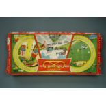 A Mettoy No. 6410 "Mechanical Road Race Track & Car" with automatic route switches and vehicles,