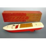 A Harold Flory "The Swift" electric motor boat, in original carton