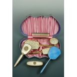 A cased 1950s dressing table set etc