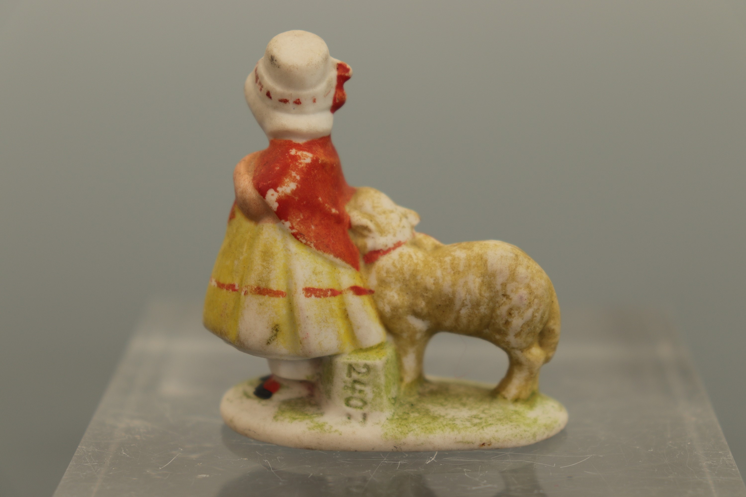 A Belle-Epoque porcelain pin lady together with a souvenir of Edinburgh (a/f) and a bisque porcelain - Image 5 of 5