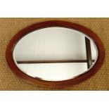 A Victorian mahogany oval mirror, 77 × 55 cm