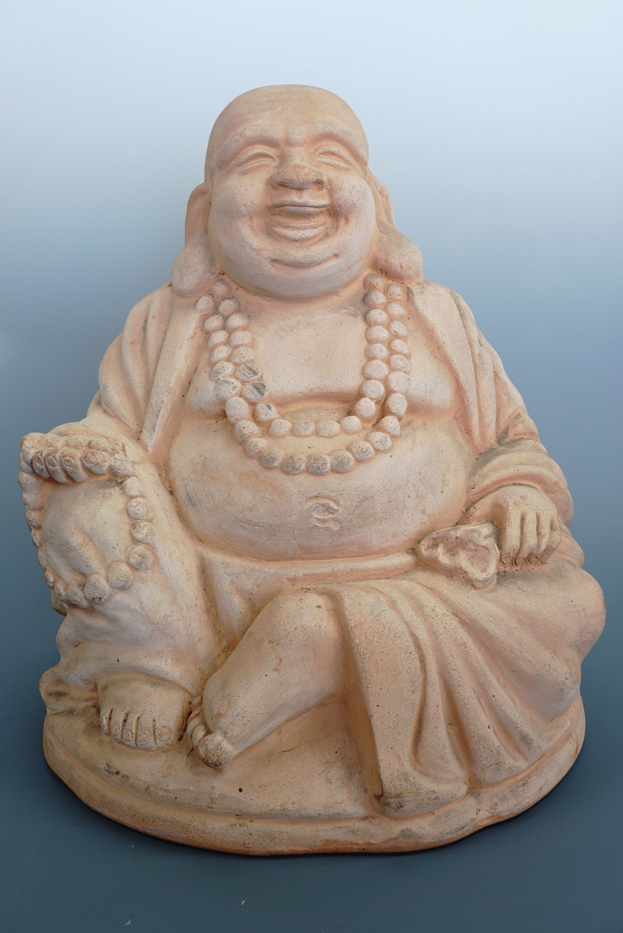 A pre cast large Buddha, 40 cm high