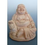 A pre cast large Buddha, 40 cm high