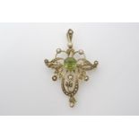 A Belle Epoque peridot and pearl openwork pendant brooch