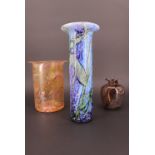 Three items of Guernsey glass, including a subtly tapering included glass vase in caramel tones, and