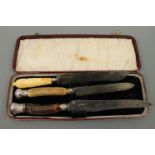 Victorian silver mounted horn and ivory handled carving knives, one having an acanthus moulded