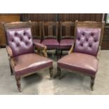 A Victorian hide-upholstered salon suite comprising two armchairs and four standard chairs