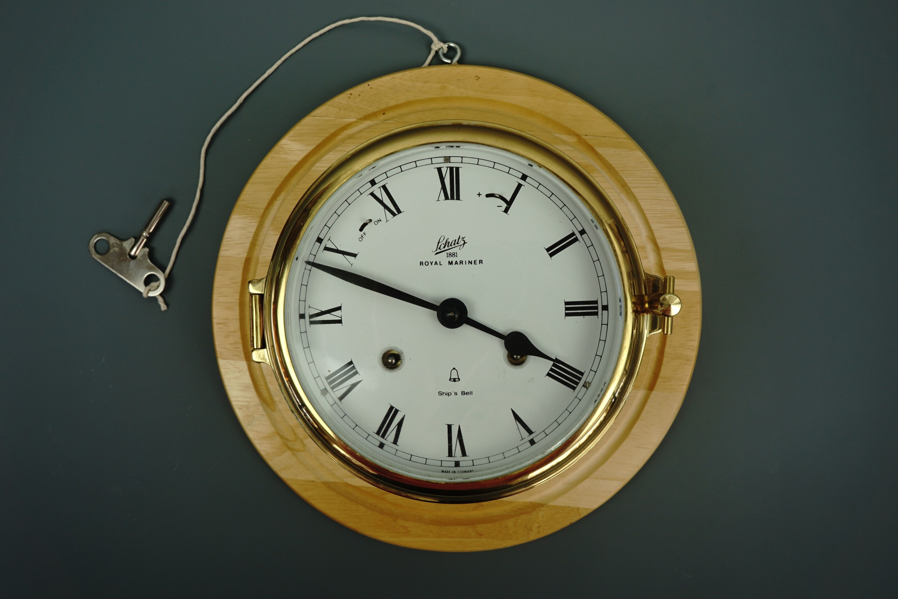 A Schatz Royal Mariner Ship's Bell brass bulkhead clock, having a two-train mechanical movement