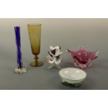 A dimpled amber glass vase and four other items of glass