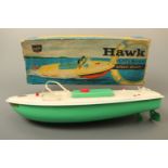 A Sutcliffe Model "Hawk" clockwork tinplate speed boat, in original carton