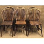 A good harlequin near-matching set of six 19th Century Windsor type kitchen chairs