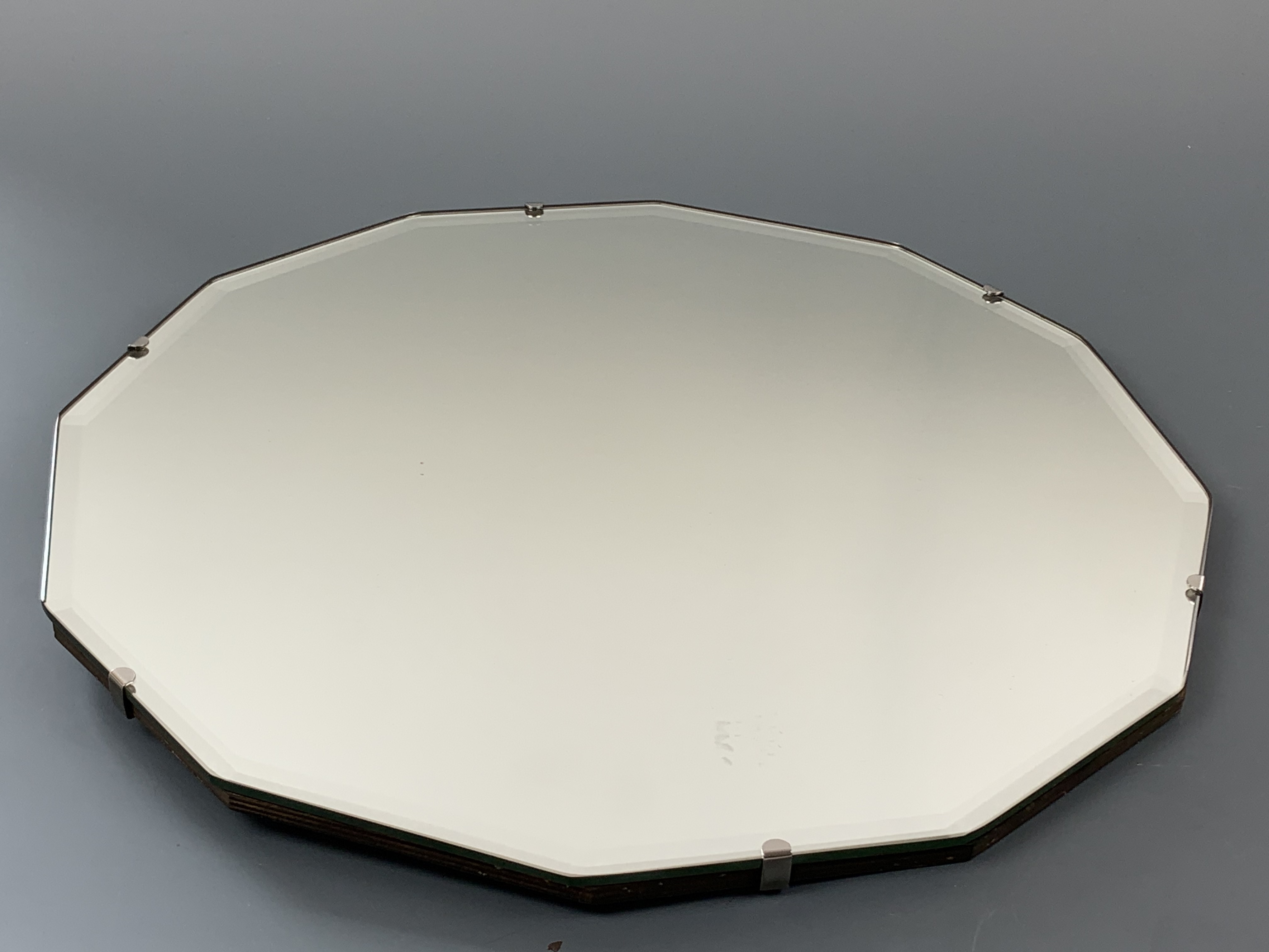 A bevel edged polygonal wall mirror circa 1930s - 1950s, 46 cm diameter - Image 4 of 4