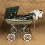 A child's vintage Silver Cross pram, twin / double with folding rain hood and sun shade, 1960s, 90 x