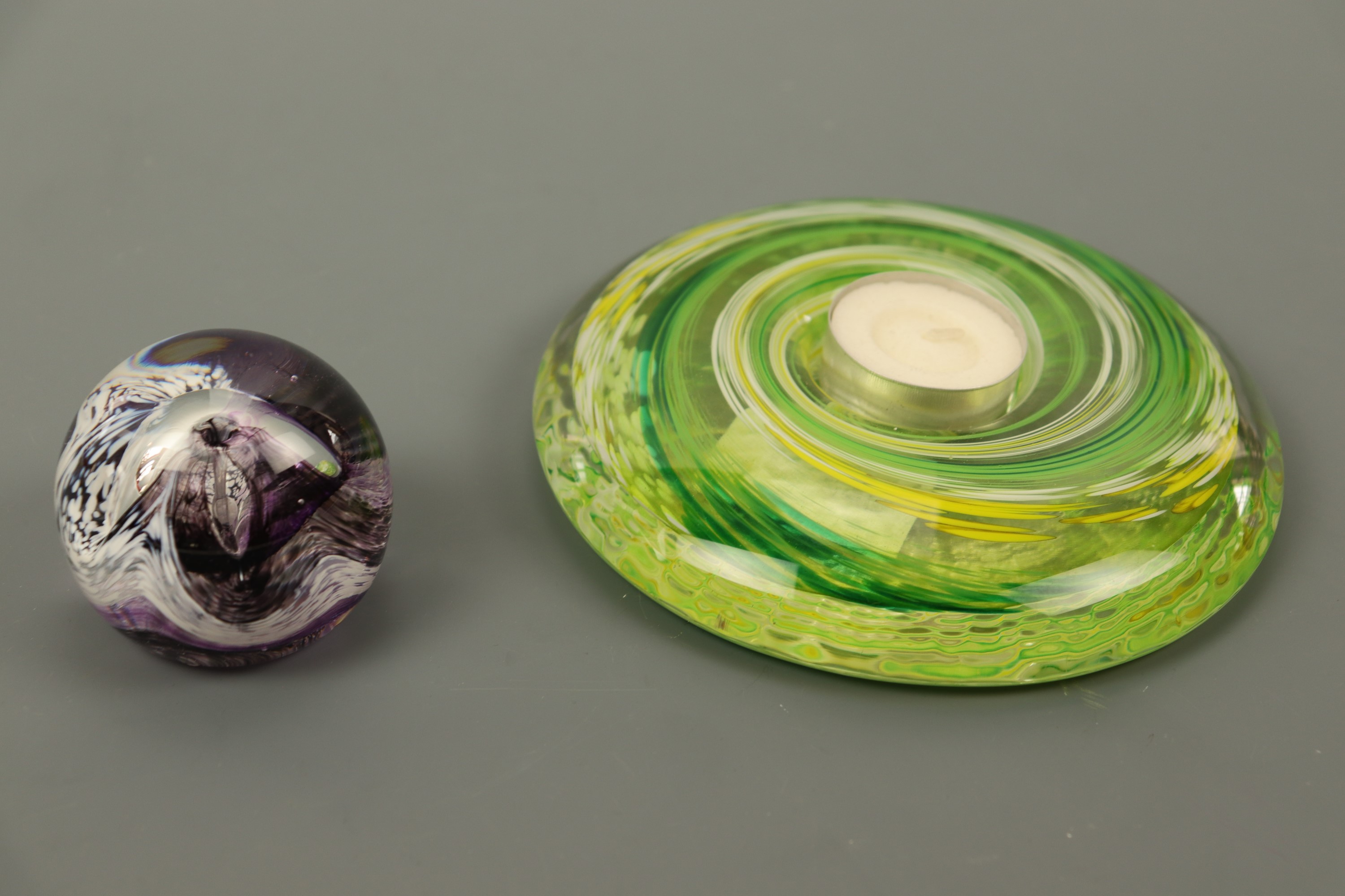 A Caithness Mooncrystal paperweight and a Scottish Borders art glass candle holder