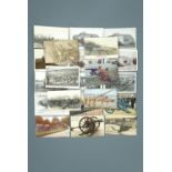 A group of postcards depicting Great War tanks, artillery etc